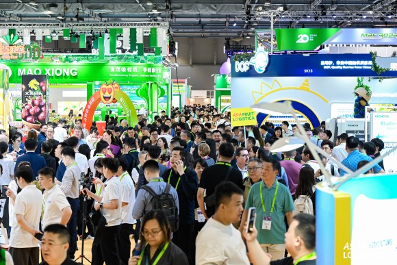 An exhibition hall full of people.