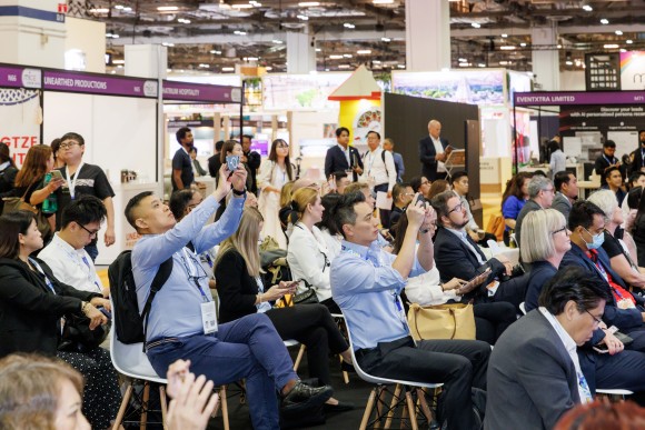Partcipants engage with the programme at MICE Show Asia, sharing impressions live from a conference session.